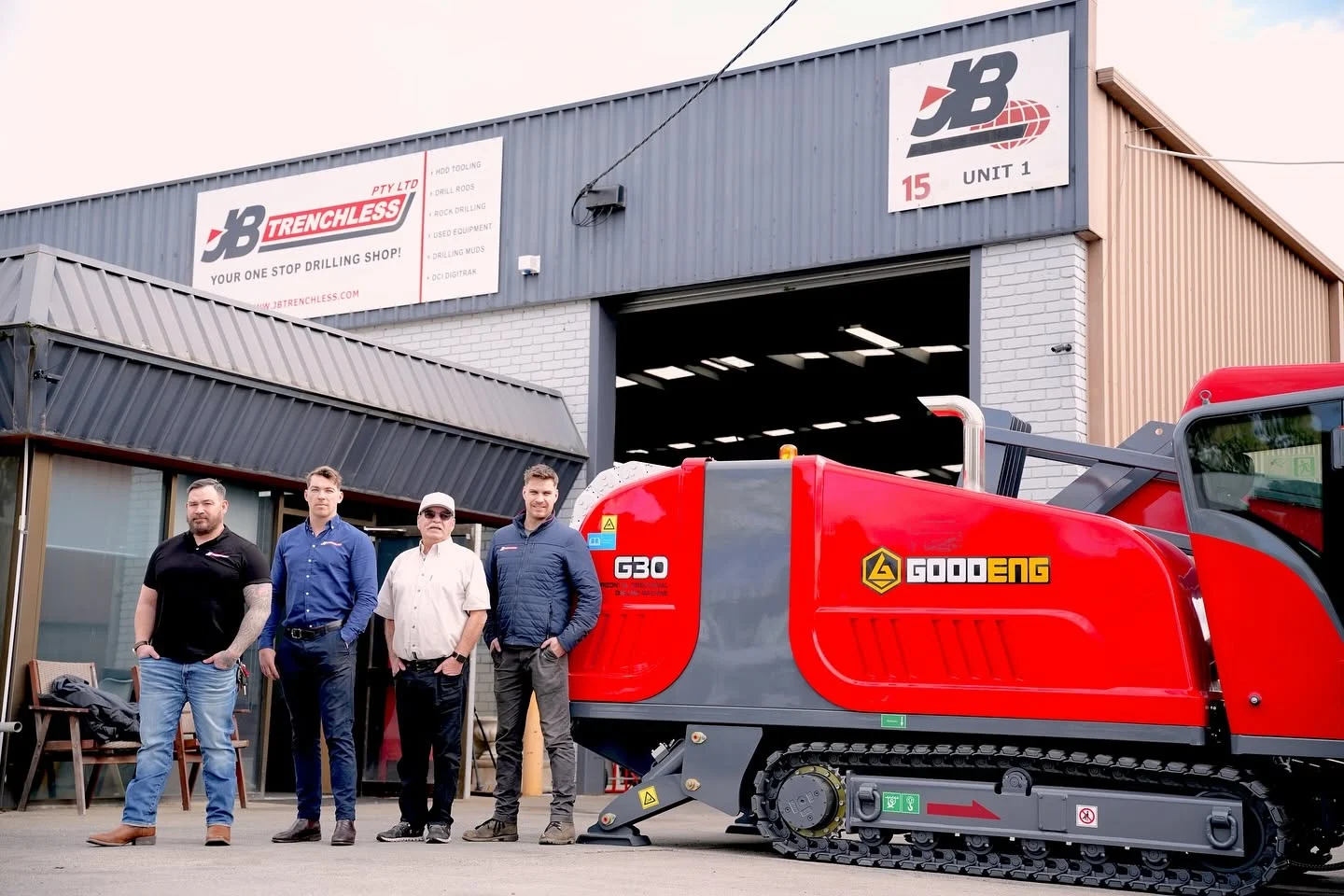 The JB Trenchless team beside their drilling equipment